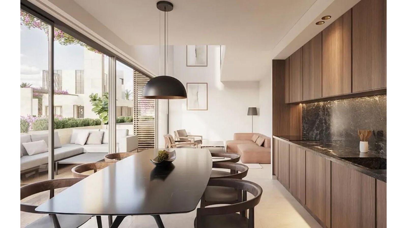 Moderne eetkamer in Estepona met uitzicht op het terras en strakke keuken.